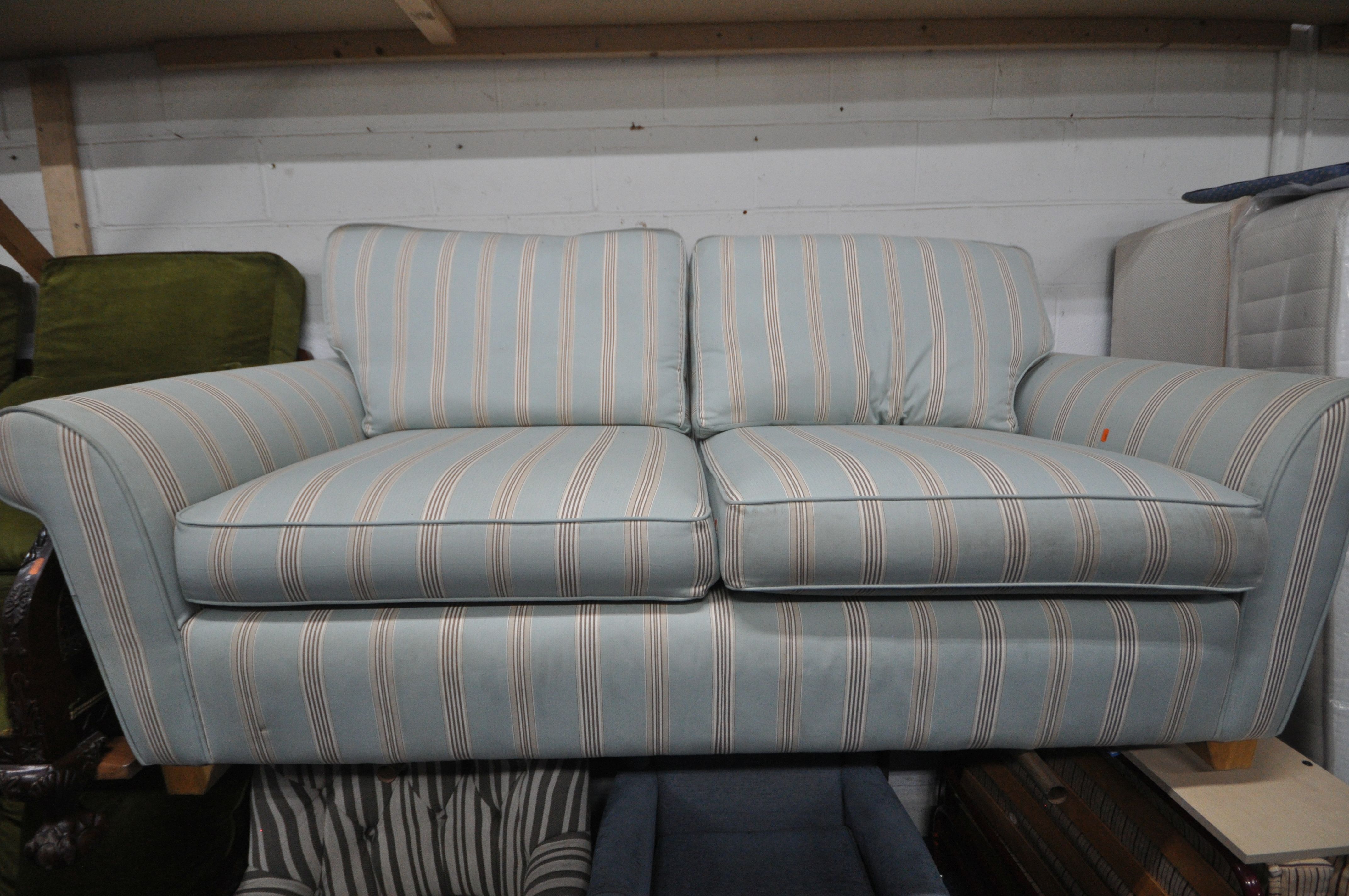 A BLUE AND STRIPPED UPHOLSTERED TWO SEATER SOFA, length 202cm x depth 90cm x height 95cm (