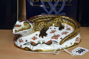 A BOXED ROYAL CROWN DERBY 'CROCODILE' PAPERWEIGHT, with gold stopper, red printed backstamp and date