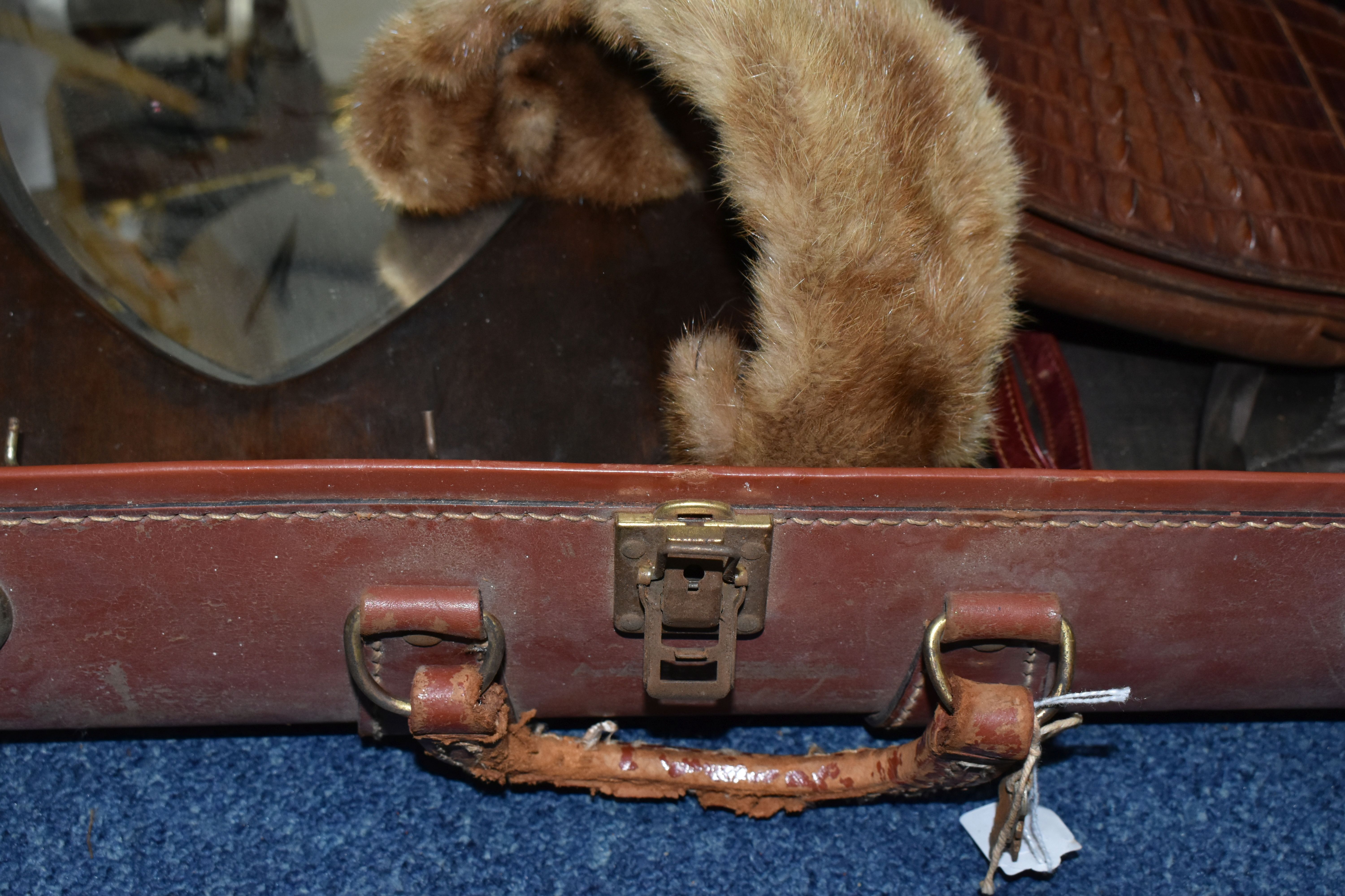 A BROWN TRAVELLING TRUNK, containing two brown leather school satchels (one monogrammed), a brown - Image 4 of 5