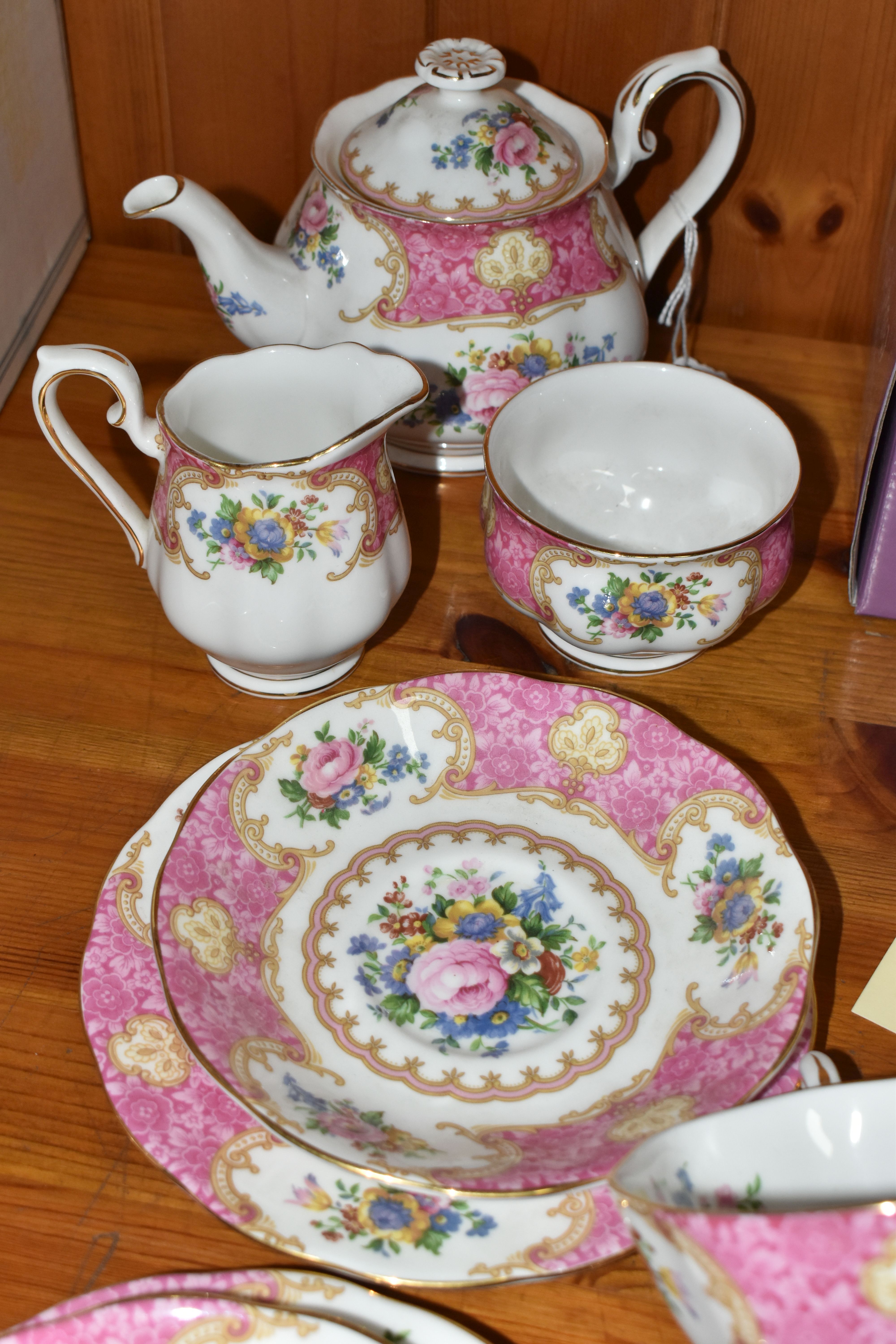 A ROYAL ALBERT 'LADY CARLYLE' PATTERN TEA SET FOR TWO, comprising a small teapot, milk jug, sugar - Image 5 of 5