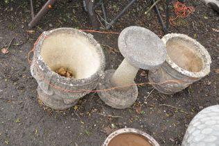 TWO MODERN COMPOSITE GARDEN POTS both 56cm in diameter and a bird bath with tapered base and