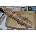 A ROLLED SNAKE SKIN, possibly a python, length approximately 310cm in length and 50cm in width (