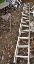 AN ALUMINIUM DOUBLE EXTENSION LADDER with 12 rungs to each 350cm section