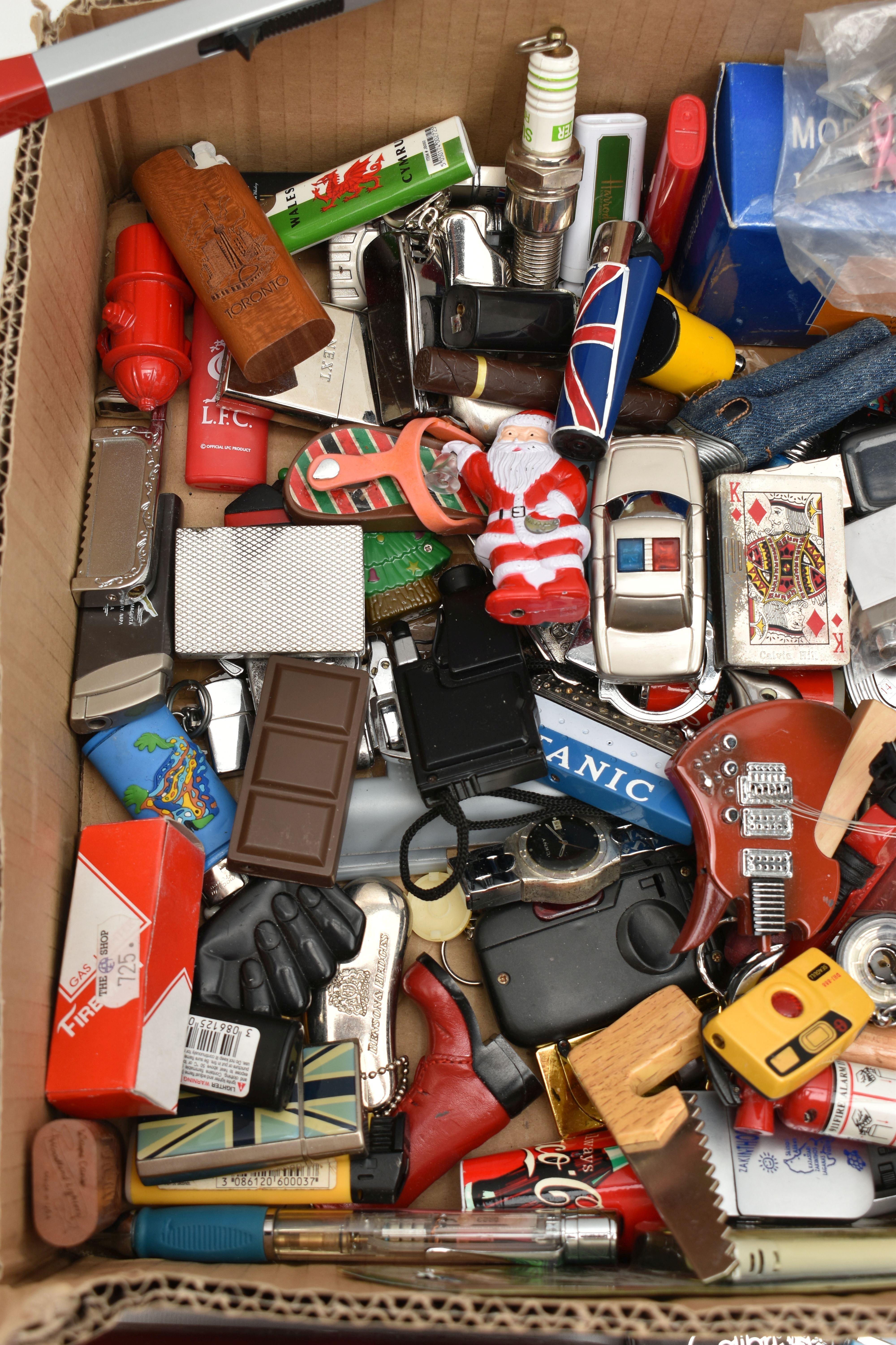 A BOX OF ASSORTED ITEMS, to include various novelty lighters, in forms such as a phone, chocolate, - Image 2 of 5