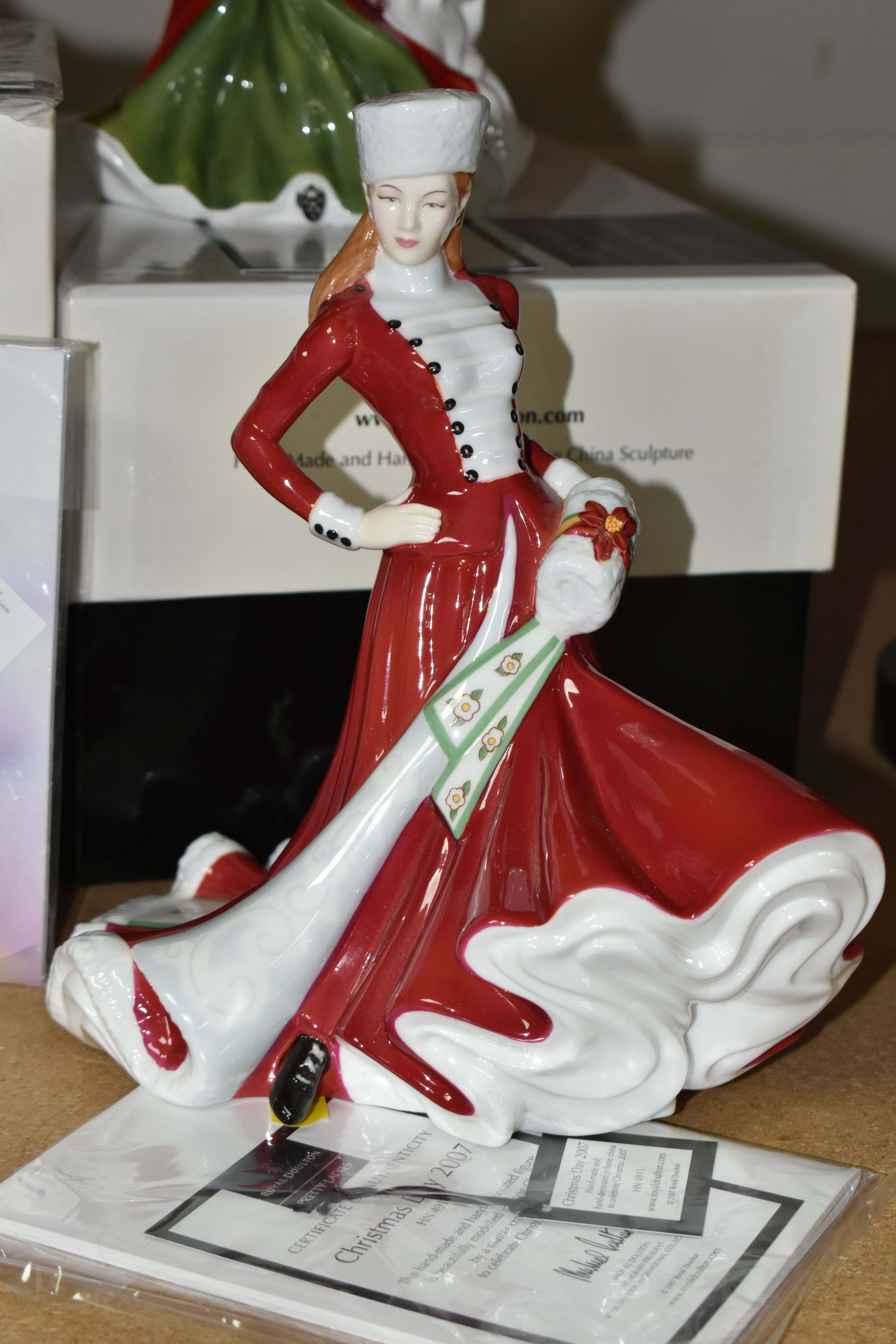 FOUR ROYAL DOULTON CHRISTMAS DAY FIGURINES, comprising 2005 HN4723 with certificate and box, 2006 - Image 2 of 5