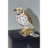 A BOXED ROYAL CROWN DERBY 'SONG THRUSH' PAPERWEIGHT, having a gold stopper, red printed backstamp
