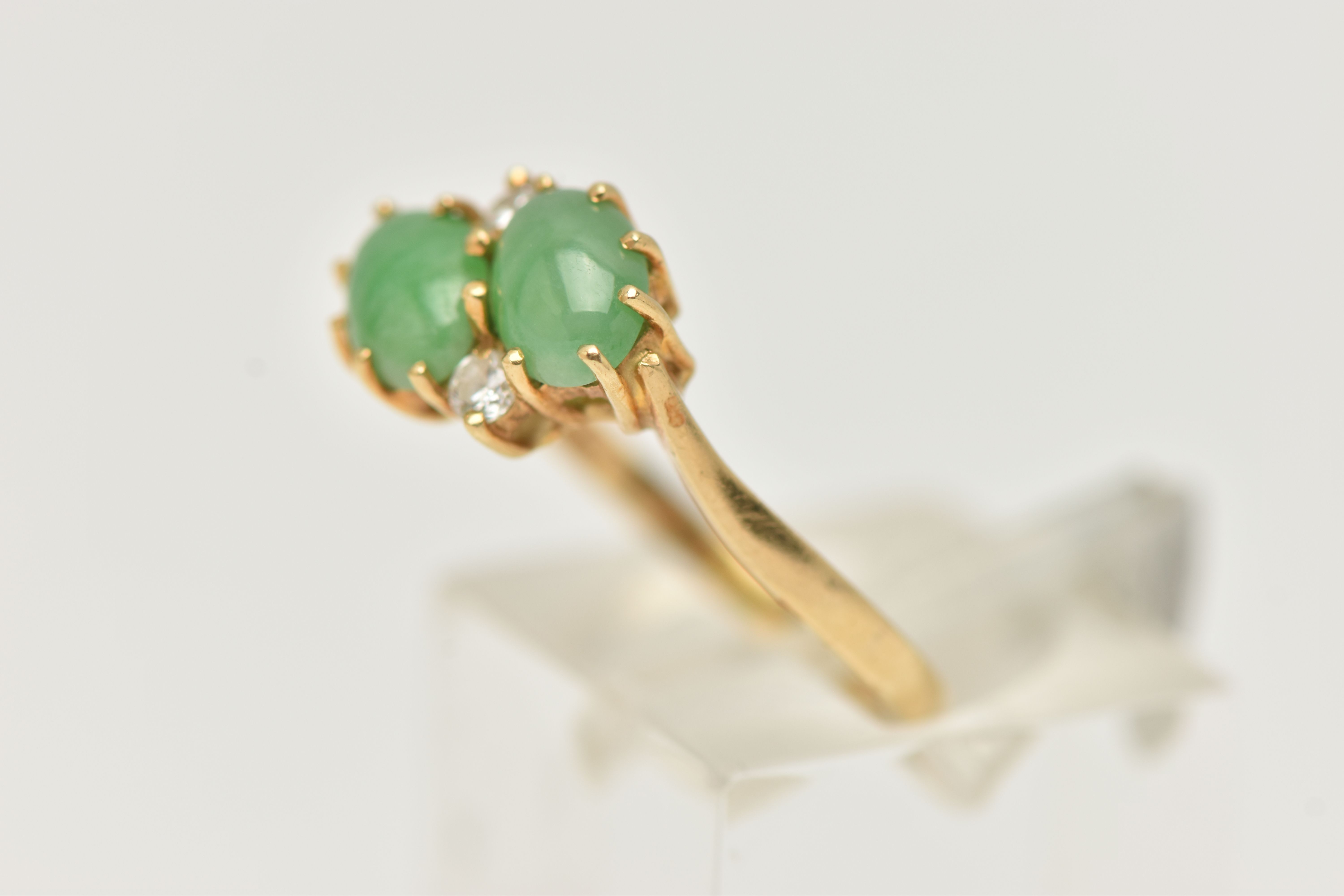 AN 18CT GOLD JADE AND DIAMOND RING, of crossover design, claw set horizontally with two oval jade - Image 2 of 5