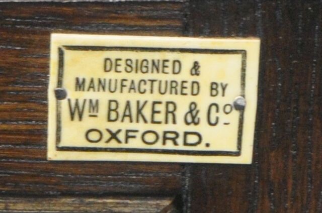 W M BAKER AND CO, OXFORD, AN EARLY 20TH CENTURY OAK SECTIONAL BOOKCASE, with one deep bottom section - Image 6 of 6