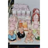 A COLLECTION OF PIG THEMED CERAMICS, to include five Wade Nat West piggy banks: Sir Nathaniel (toe