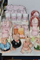A COLLECTION OF PIG THEMED CERAMICS, to include five Wade Nat West piggy banks: Sir Nathaniel (toe