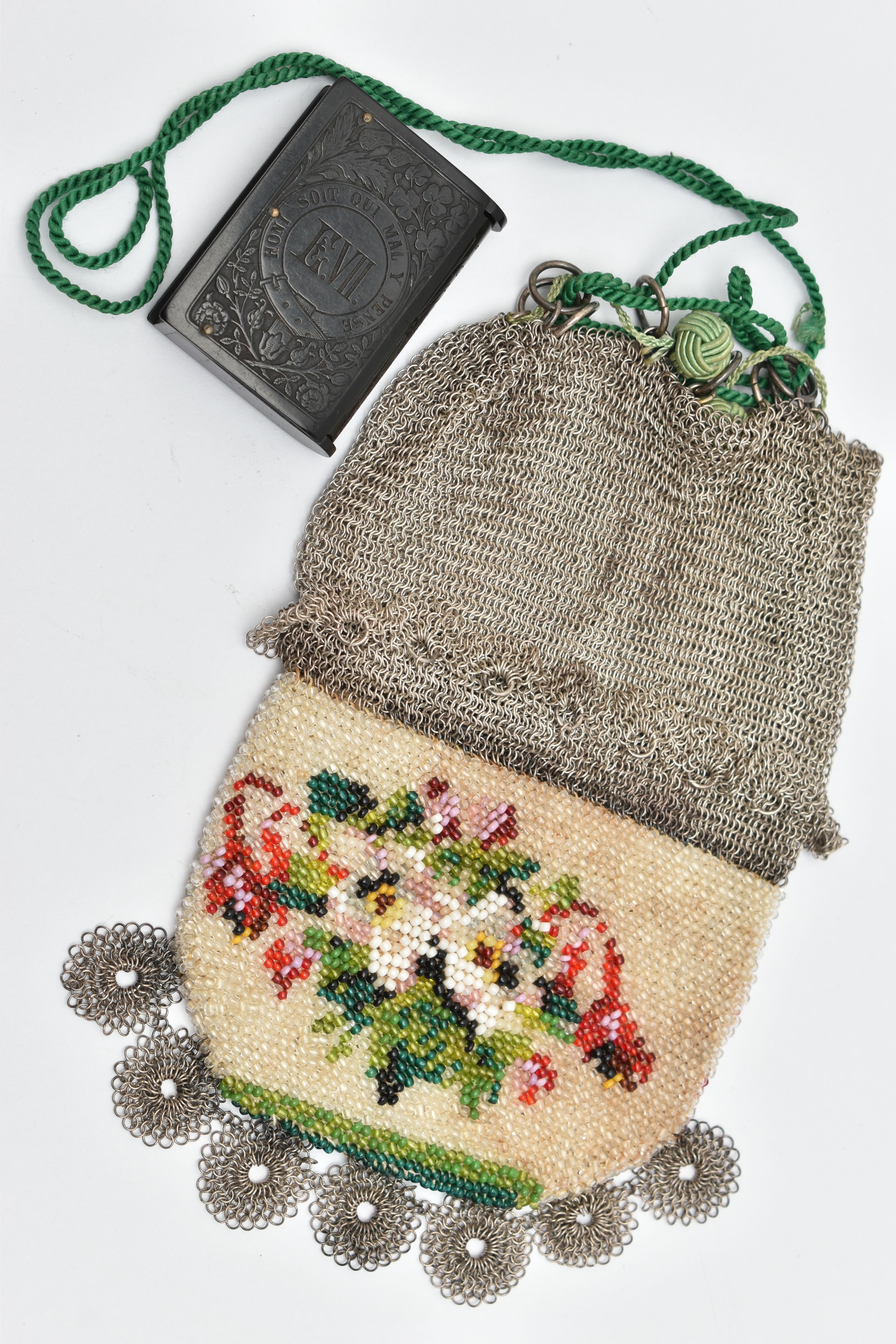 A CHAIN MAIL PURSE AND A VULCANITE VESTA CASE, white metal chain mail with a decorative floral - Image 4 of 5
