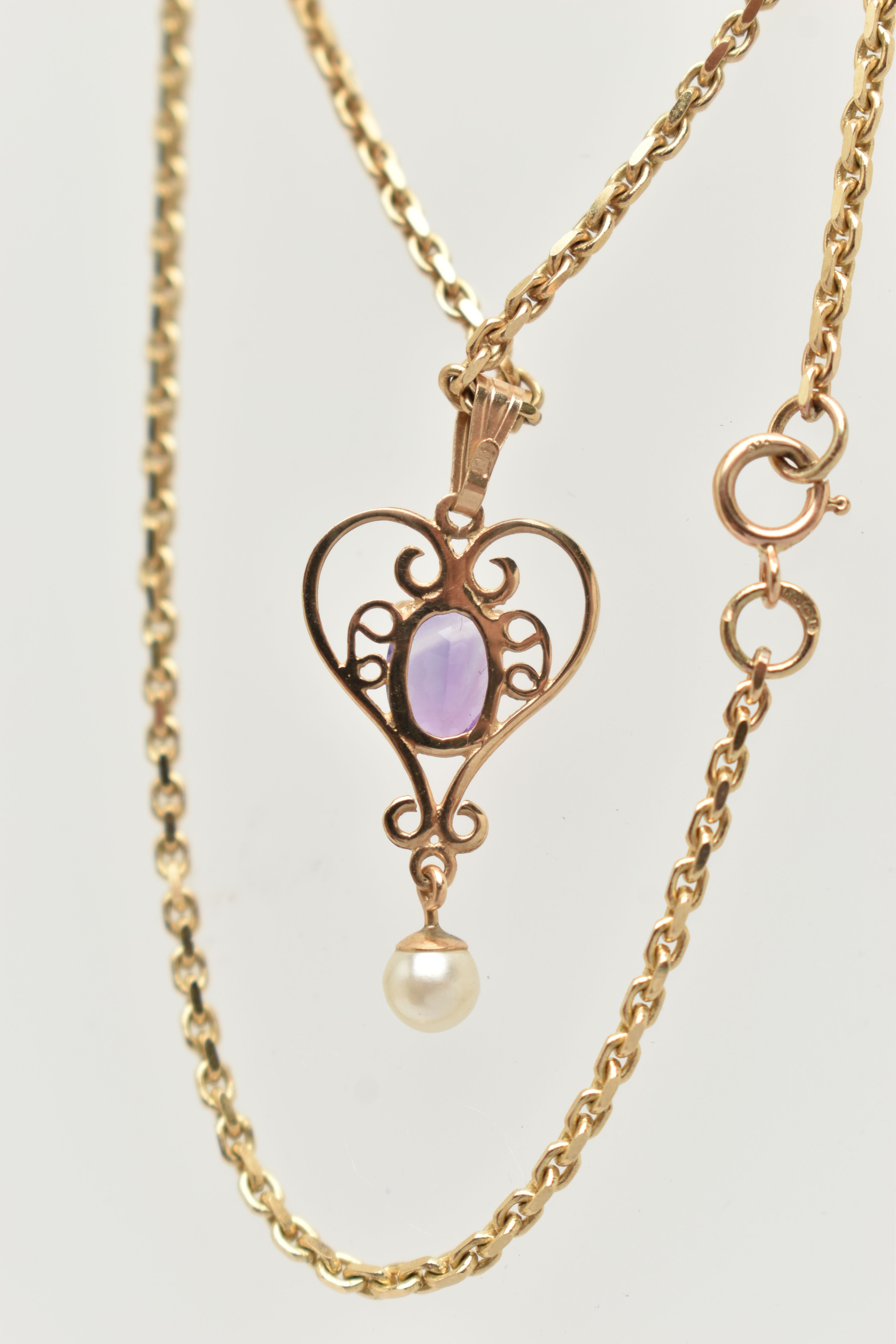 A 9CT GOLD PENDANT NECKLACE, heart shape scrolling pendant set with an oval cut amethyst four claw - Image 4 of 4