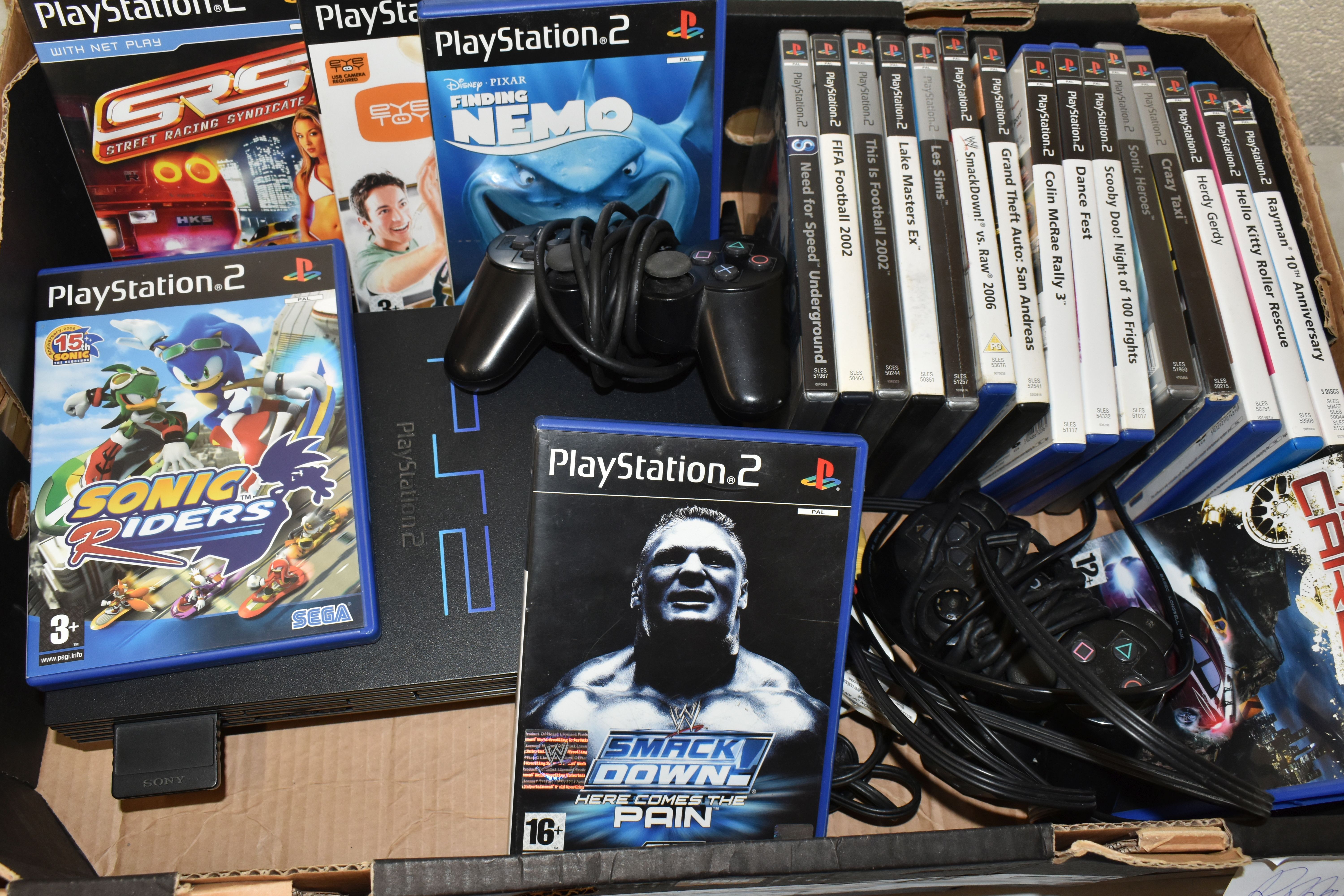 PLAYSTATION 2 CONSOLE AND GAMES, console is in working condition (see photo, television not