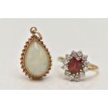 A 9CT GOLD CLUSTER RING AND A PENDANT, the oval cluster set with an oval cut garnet, in a surround