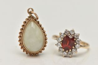 A 9CT GOLD CLUSTER RING AND A PENDANT, the oval cluster set with an oval cut garnet, in a surround