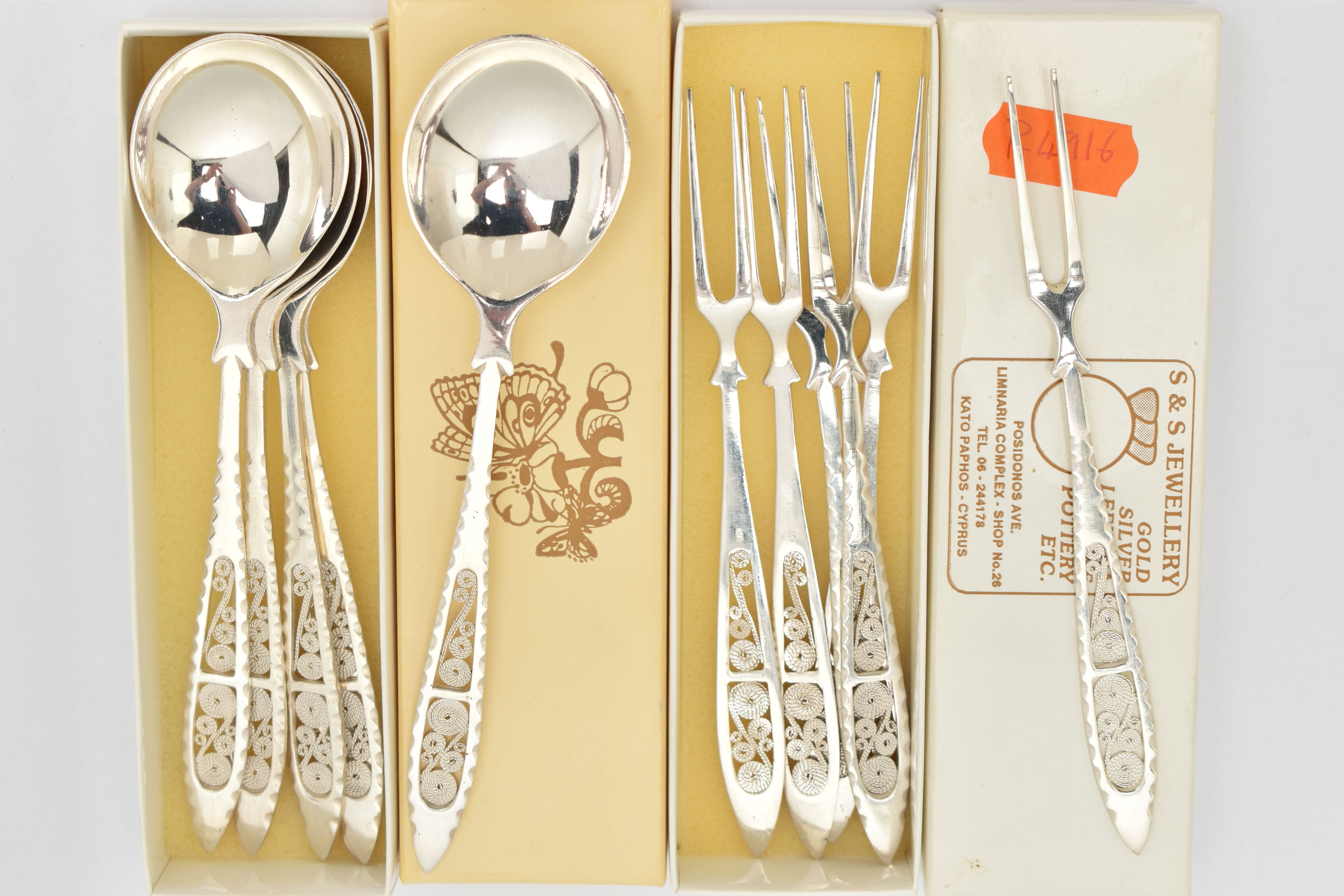 A SELECTION OF CONTINENTAL WHITE METAL CUTLERY, to include six spoons and six forks, with wire