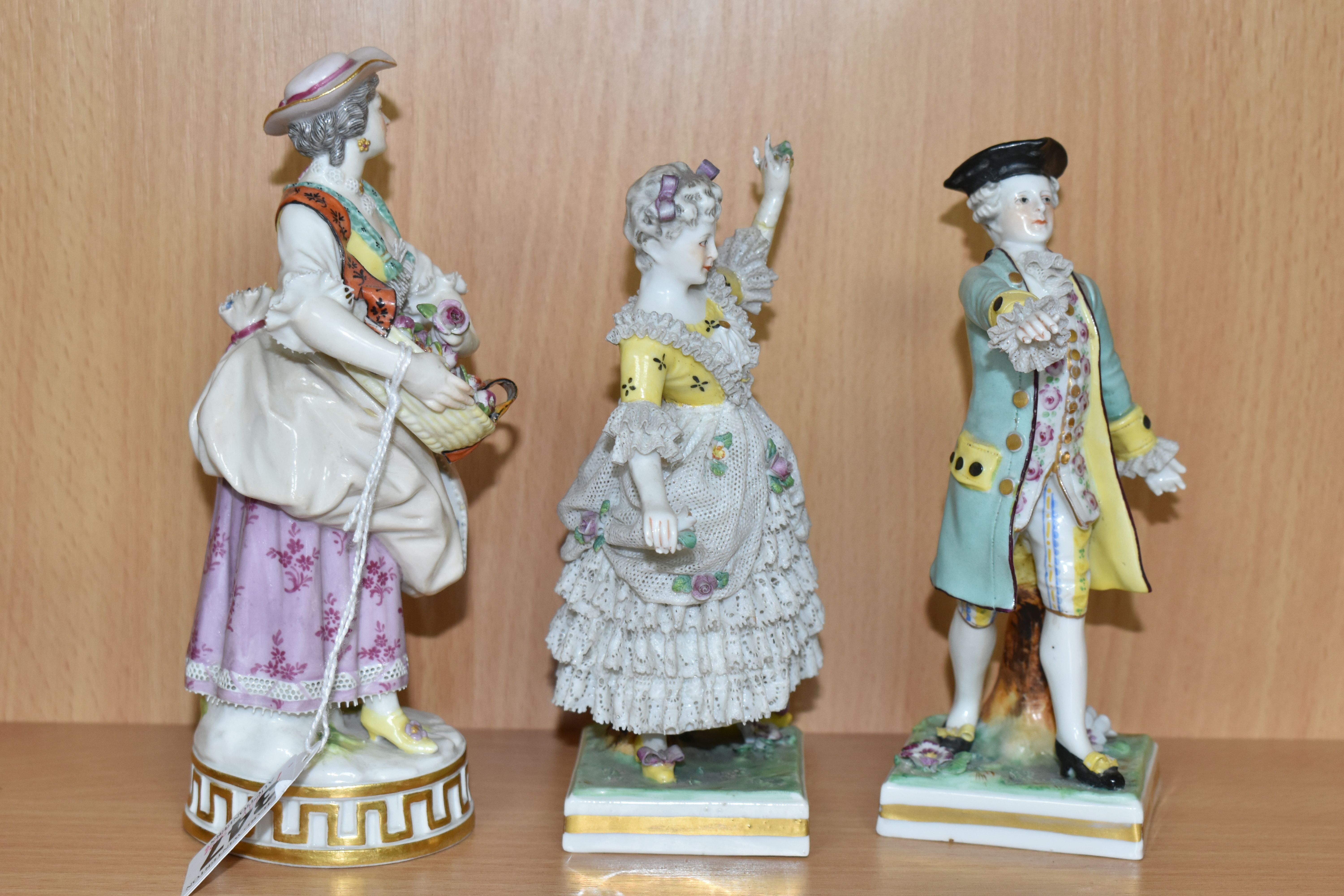 A MEISSEN PORCELAIN FIGURE OF A GARDENER AND TWO OTHER CONTINENTAL PORCELAIN FIGURES, the Meissen - Image 2 of 5