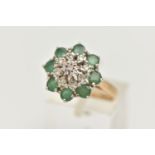 A 9CT GOLD EMERALD AND DIAMOND CLUSTER RING, tiered cluster set with nine illusion set single cut