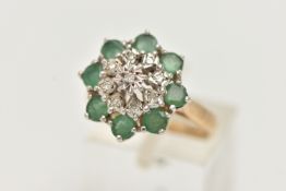 A 9CT GOLD EMERALD AND DIAMOND CLUSTER RING, tiered cluster set with nine illusion set single cut