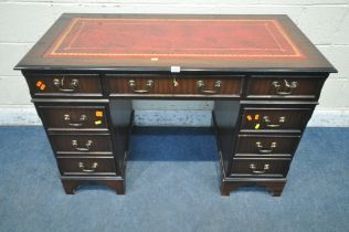 A 20TH CENTURY MAHOGANY TWIN PEDESTAL DESK, with an oxblood leather writing surface, and an