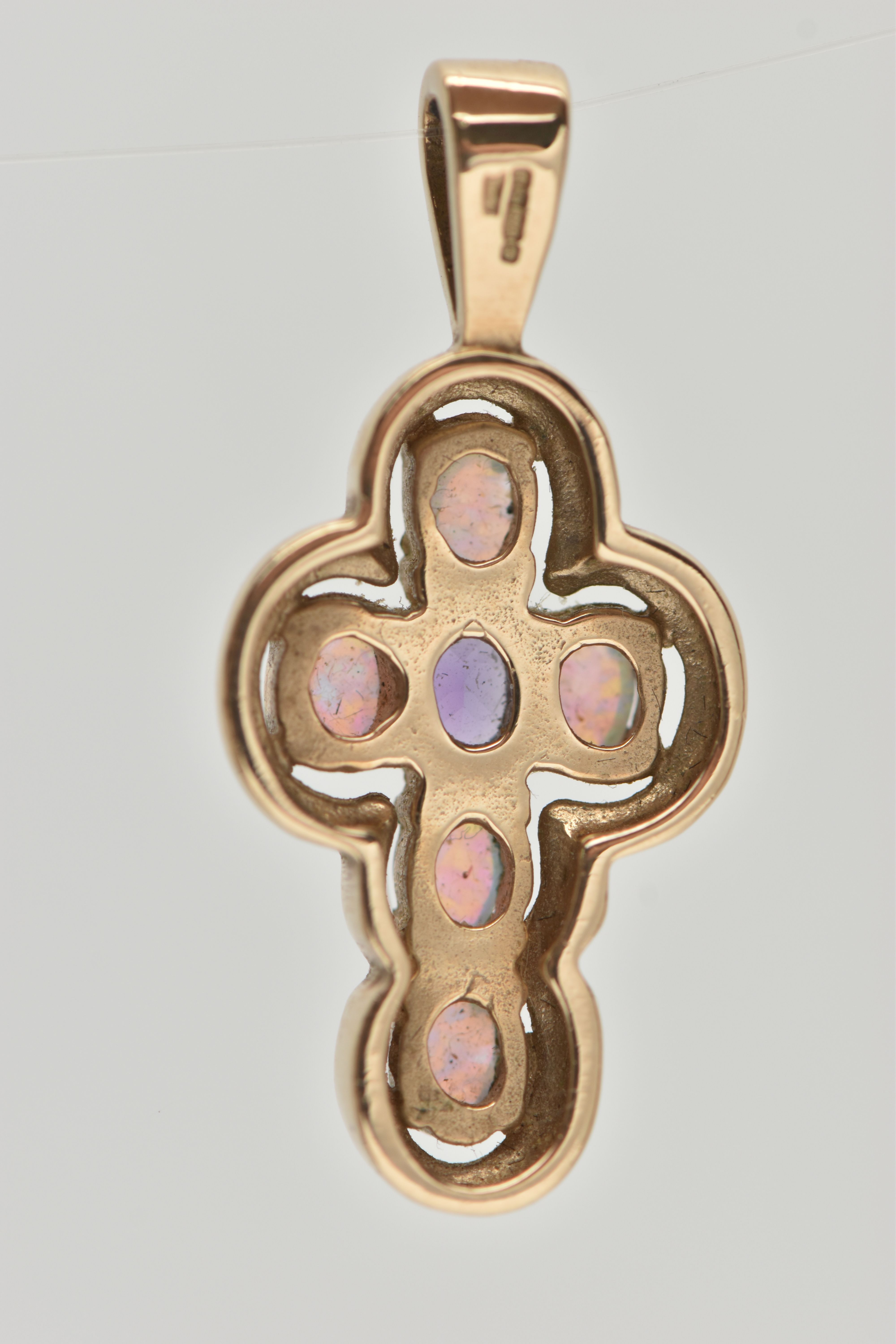 A 9CT GOLD AMETHYST AND SYNTHETIC OPAL CROSS PENDANT, set centrally with an oval cut amethyst, and - Image 4 of 4