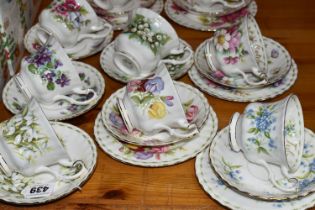 A GROUP OF ROYAL ALBERT 'FLOWER OF THE MONTH SERIES' TEAWARE, comprising a 'Forget Me Not' pattern
