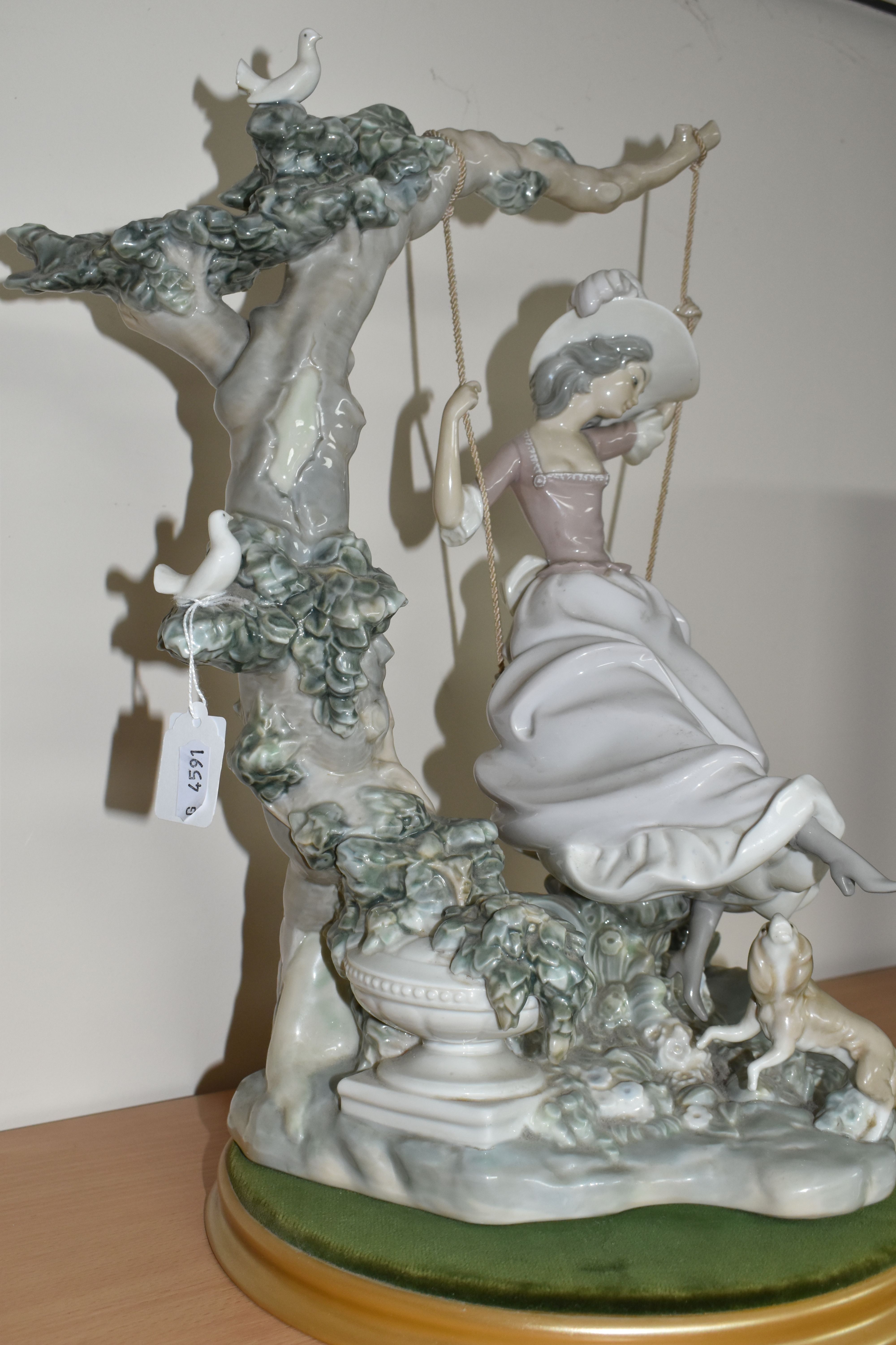 A LLADRO 'SWINGING' SCULPTURE OF A GIRL ON A SWING, model no 1297, sculptor Salvador Debon, issued - Image 3 of 7