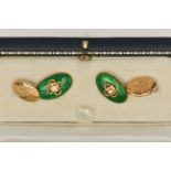 A PAIR OF 18CT GOLD ENAMEL AND DIAMOND CUFFLINKS, each designed as an oval green enamel panel with