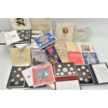 A BOX CONTAINING UK AND WORLD COIN YEAR SETS, to include a 1996 De-Lux Year set, UK Proof sets 1981,