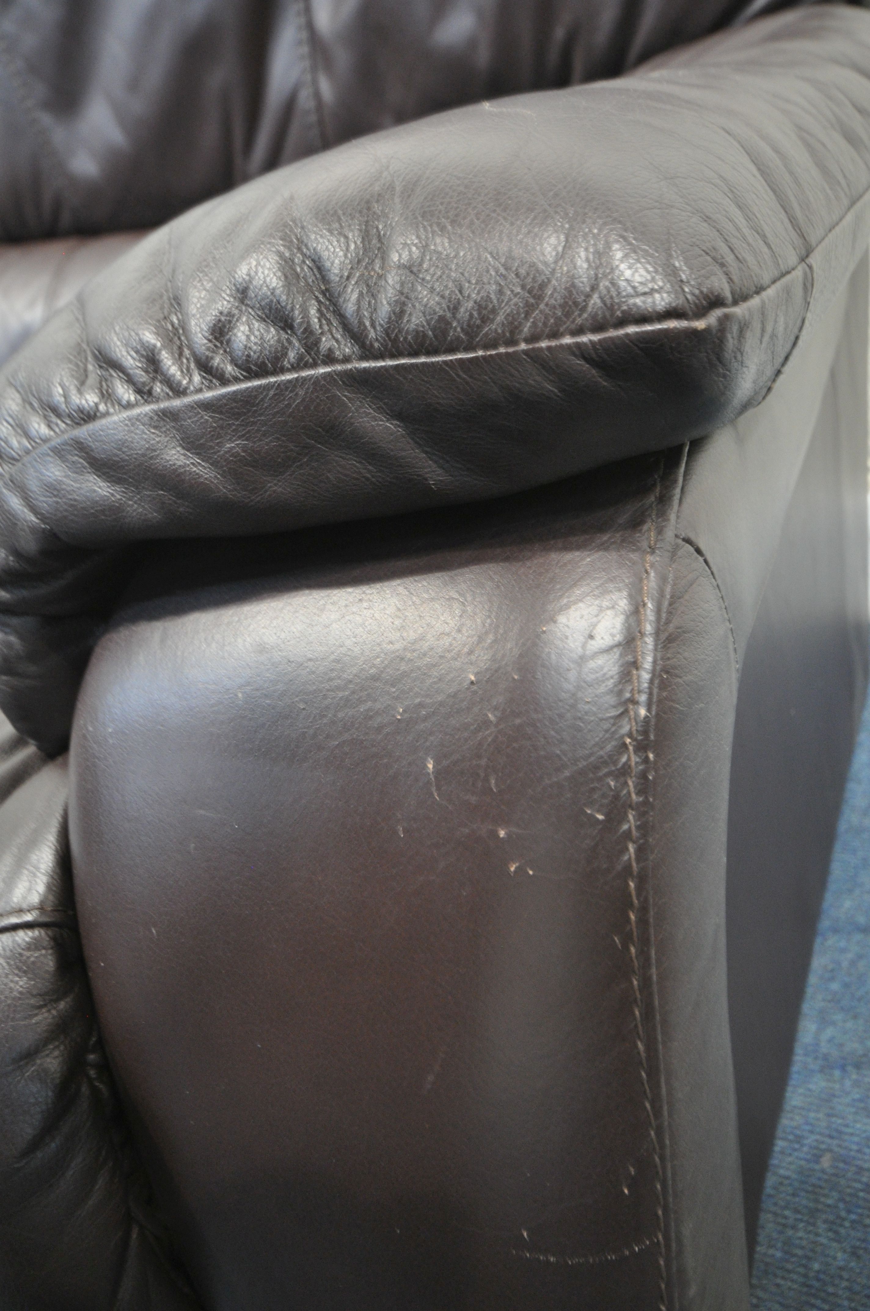 A BROWN LEATHER UPHOLSTERED TWO SEATER SOFA, length 162cm x depth 91cm x height 97cm (condition - Image 2 of 2