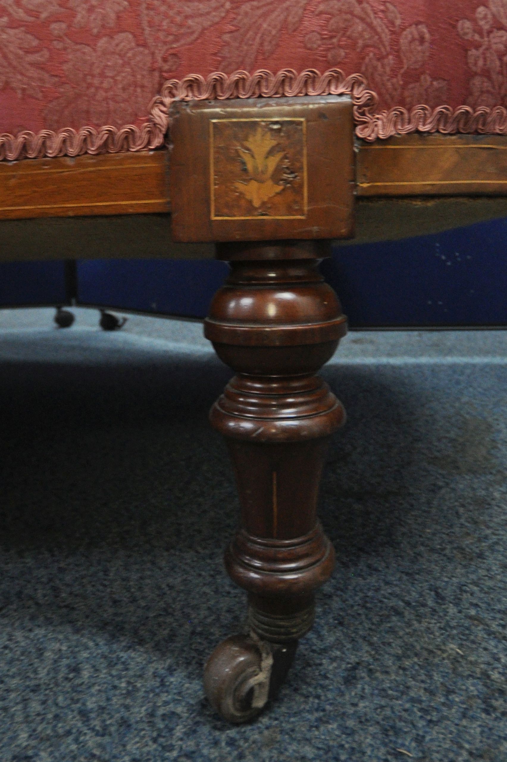 A LATE VICTORIAN WALNUT AND INLAID CHAISE LOUNGE, with pink and floral upholstery, raised on - Image 3 of 4