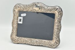 A SILVER FRONTED PICTURE FRAME, rectangular form frame, with embossed floral and foliage detail,