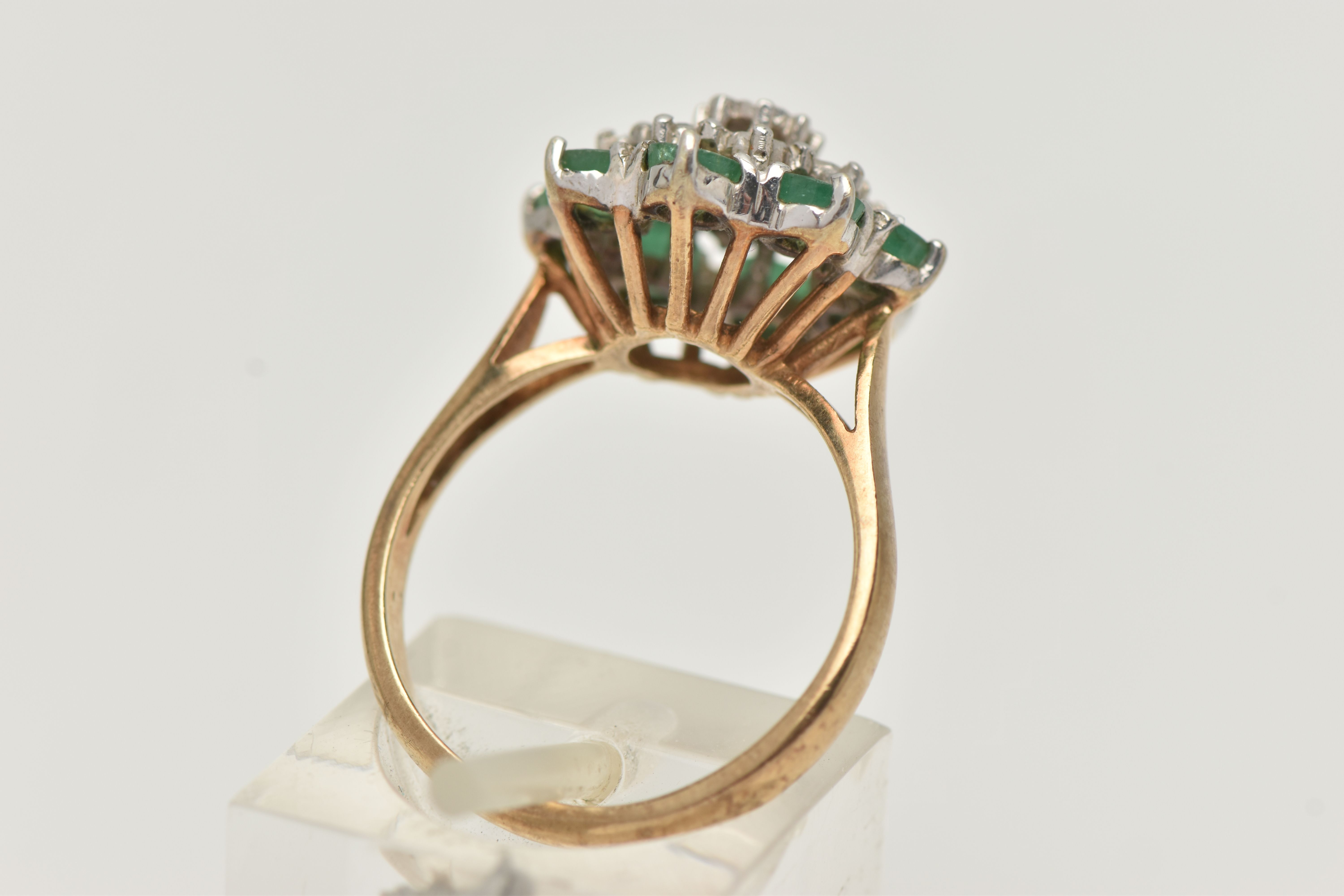 A 9CT GOLD EMERALD AND DIAMOND CLUSTER RING, tiered cluster set with nine illusion set single cut - Image 3 of 4