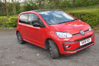 A 2019 VW UP 5 DOOR HATCHBACK CAR IN RED. 999cc petrol engine, 5 speed manual gearbox, V5c