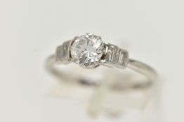 A DIAMOND RING, a principally prong set round brilliant cut diamond, approximate total carat