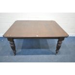 A VICTORIAN WIND OUT DINING TABLE, with canted corners, raised on turned and reeded legs, with