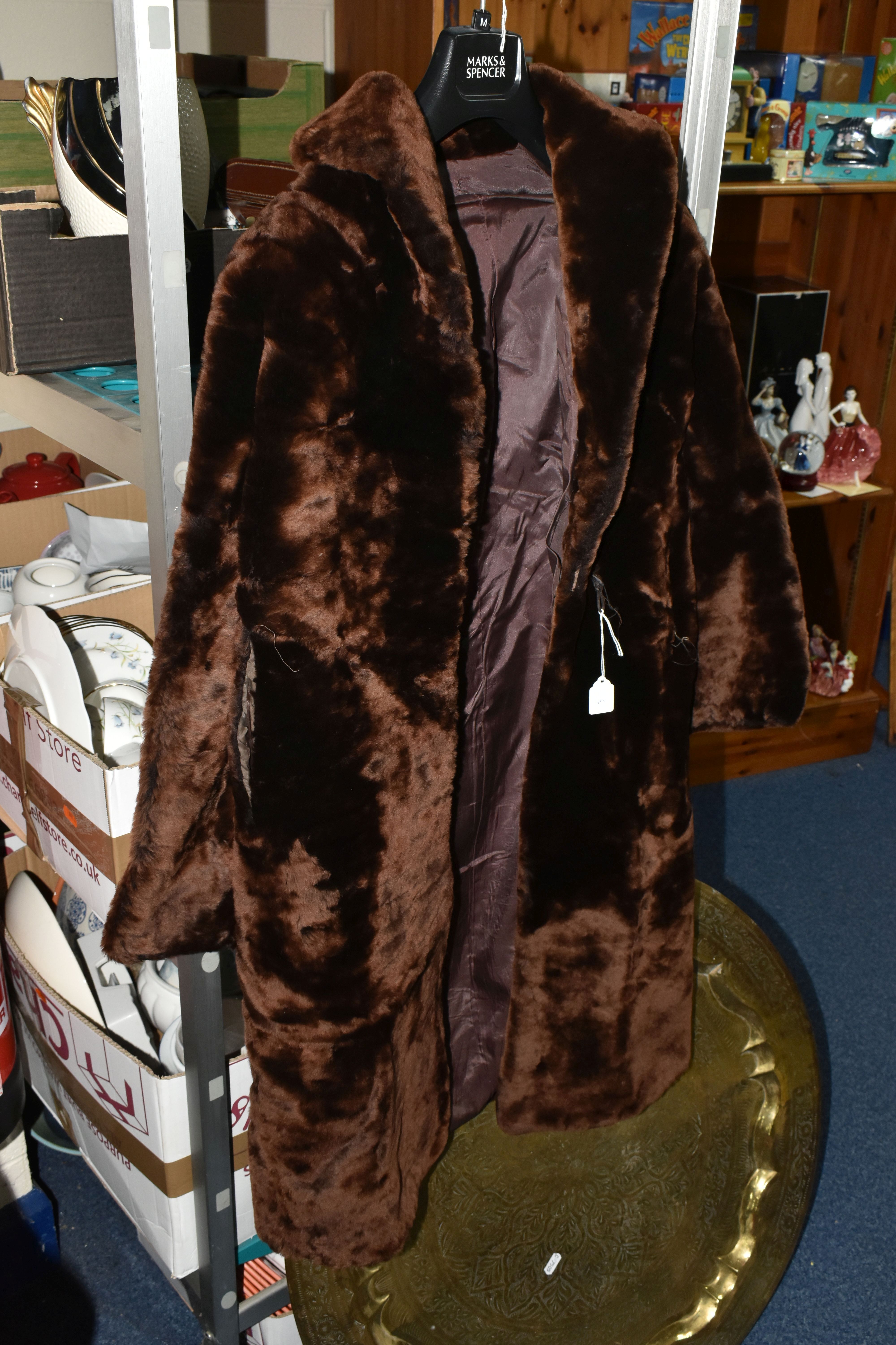 TWO BOXES OF BOOKS AND SUNDRIES, to include a vintage brown faux fur coat, large brass circular - Image 7 of 10