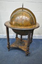 A 20TH CENTURY DRINKS GLOBE, with a hinged lid, enclosing a fitted interior, raised on spiral