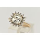 A 9CT GOLD GEM SET CLUSTER RING, mixed cushion cut colourless stone, possibly topaz, measuring