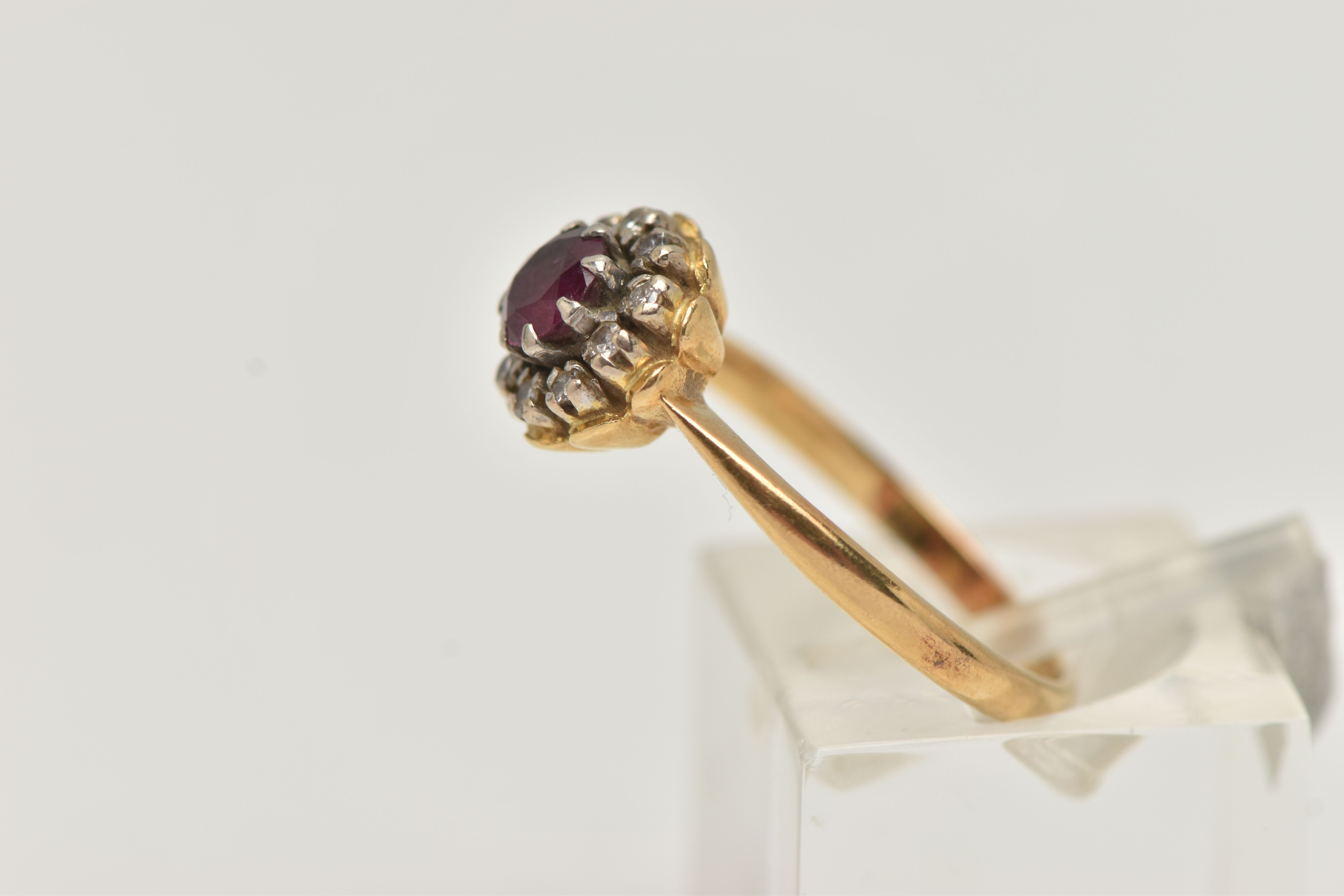 AN 18CT GOLD RUBY AND DIAMOND CLUSTER RING, of a circular form, centrally set with a circular cut - Image 2 of 4