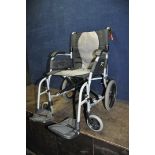 A KARMA ERGO LITE 2 MOBILITY FOLDING WHEELCHAIR with two footrests