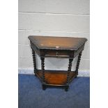 AN EARLY 20TH CENTURY OAK SIDE TABLE, with a single frieze drawer, raised on barley twist