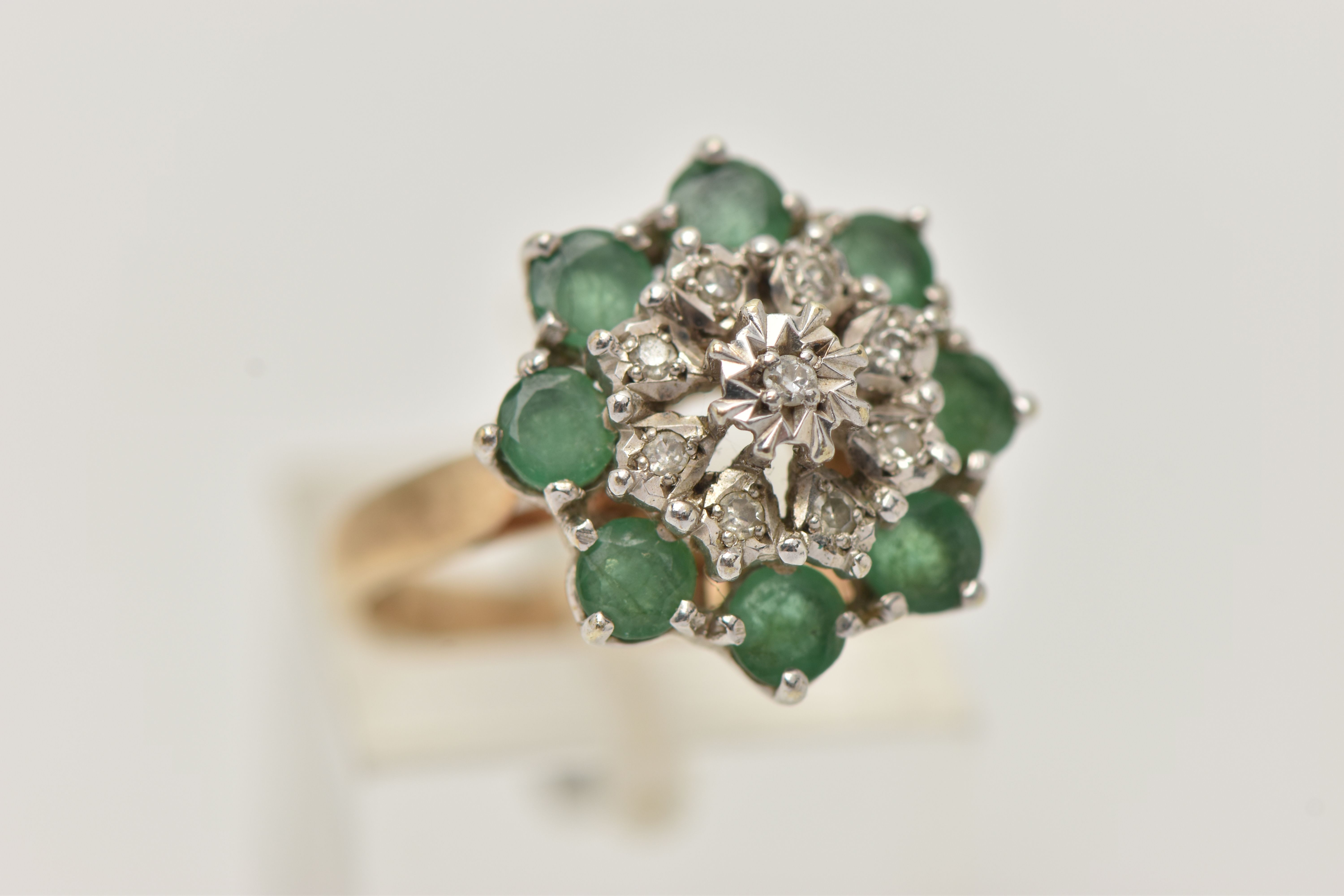 A 9CT GOLD EMERALD AND DIAMOND CLUSTER RING, tiered cluster set with nine illusion set single cut - Image 4 of 4