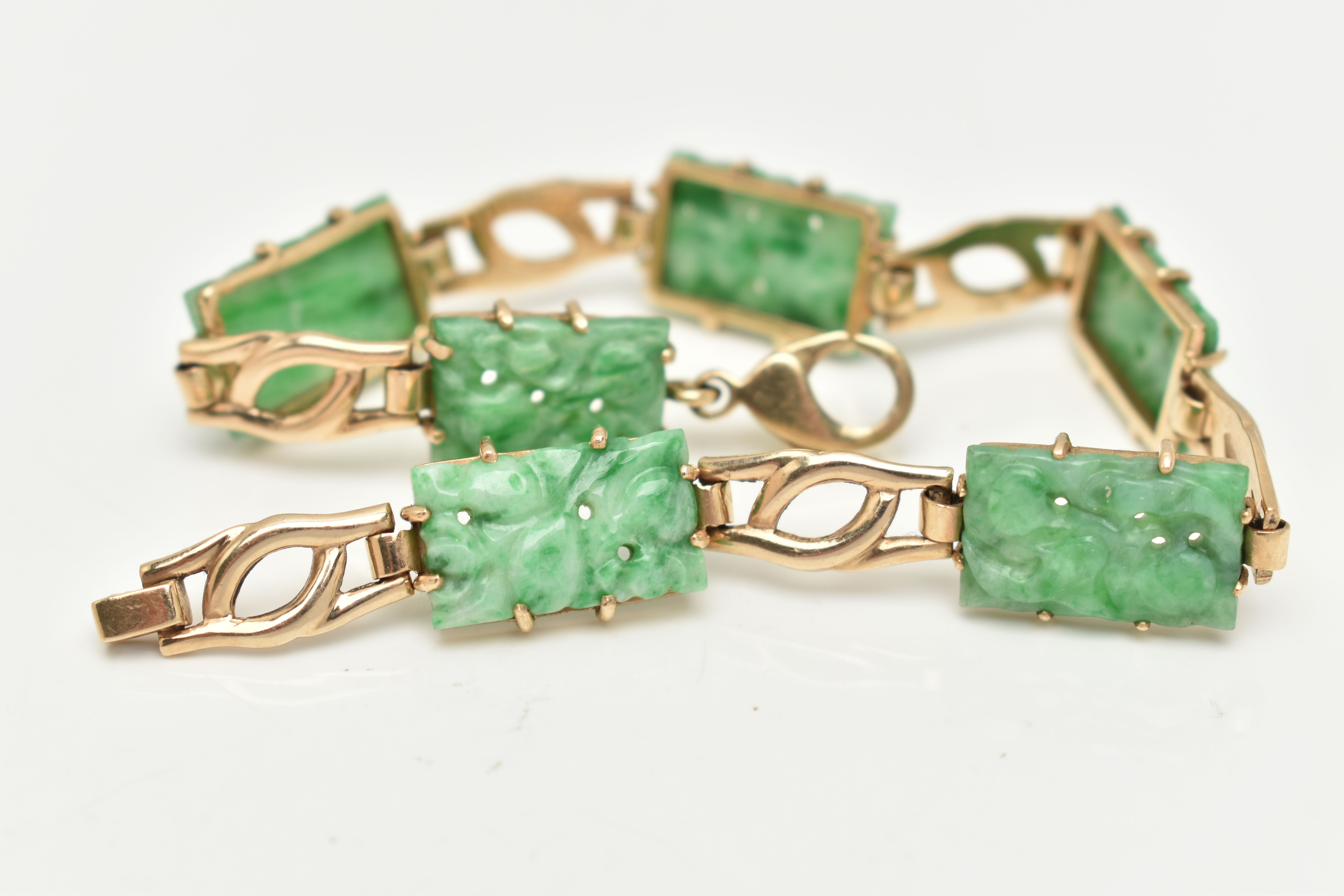 A 9CT GOLD JADE PANEL BRACELET, the rectangular jade panels carved to depict fruits and foliage, - Image 3 of 5