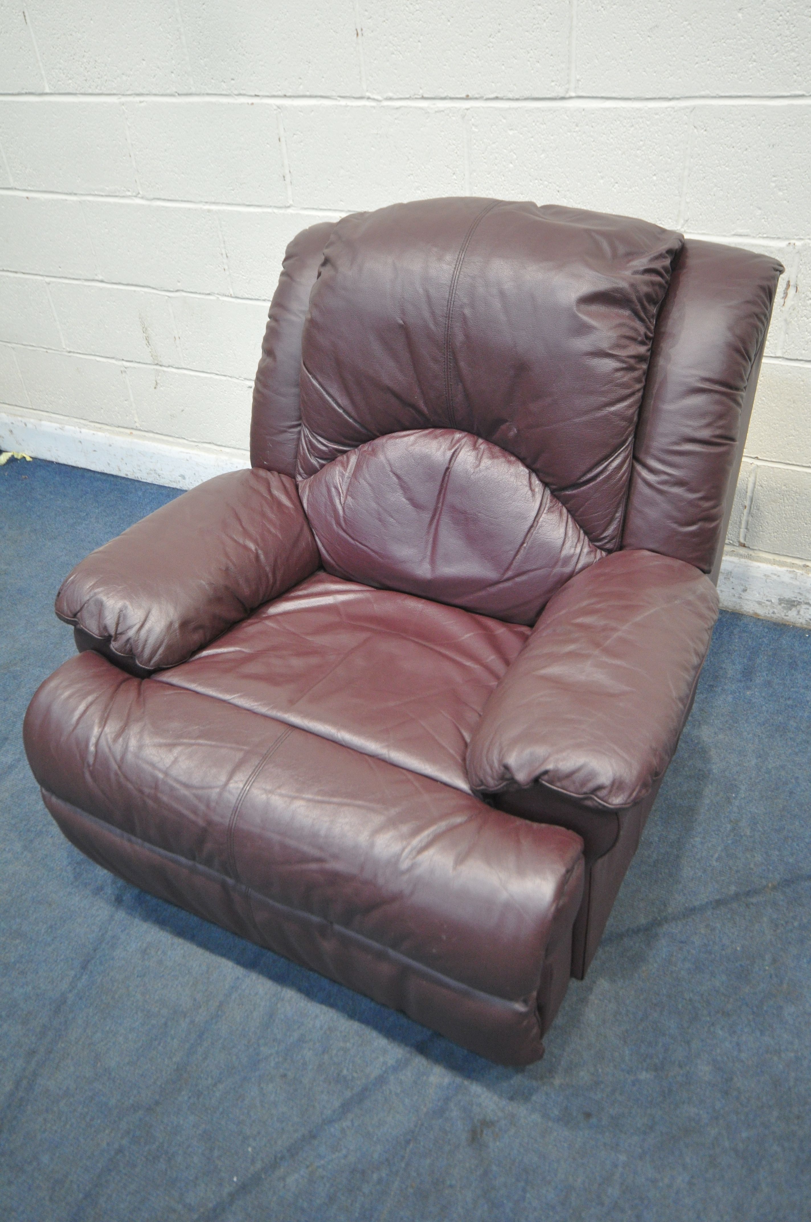 A PLUM LEATHER UPHOLSTERED THREE PIECE LOUNGE SUITE, comprising a three seater sofa, length 203cm - Image 4 of 4