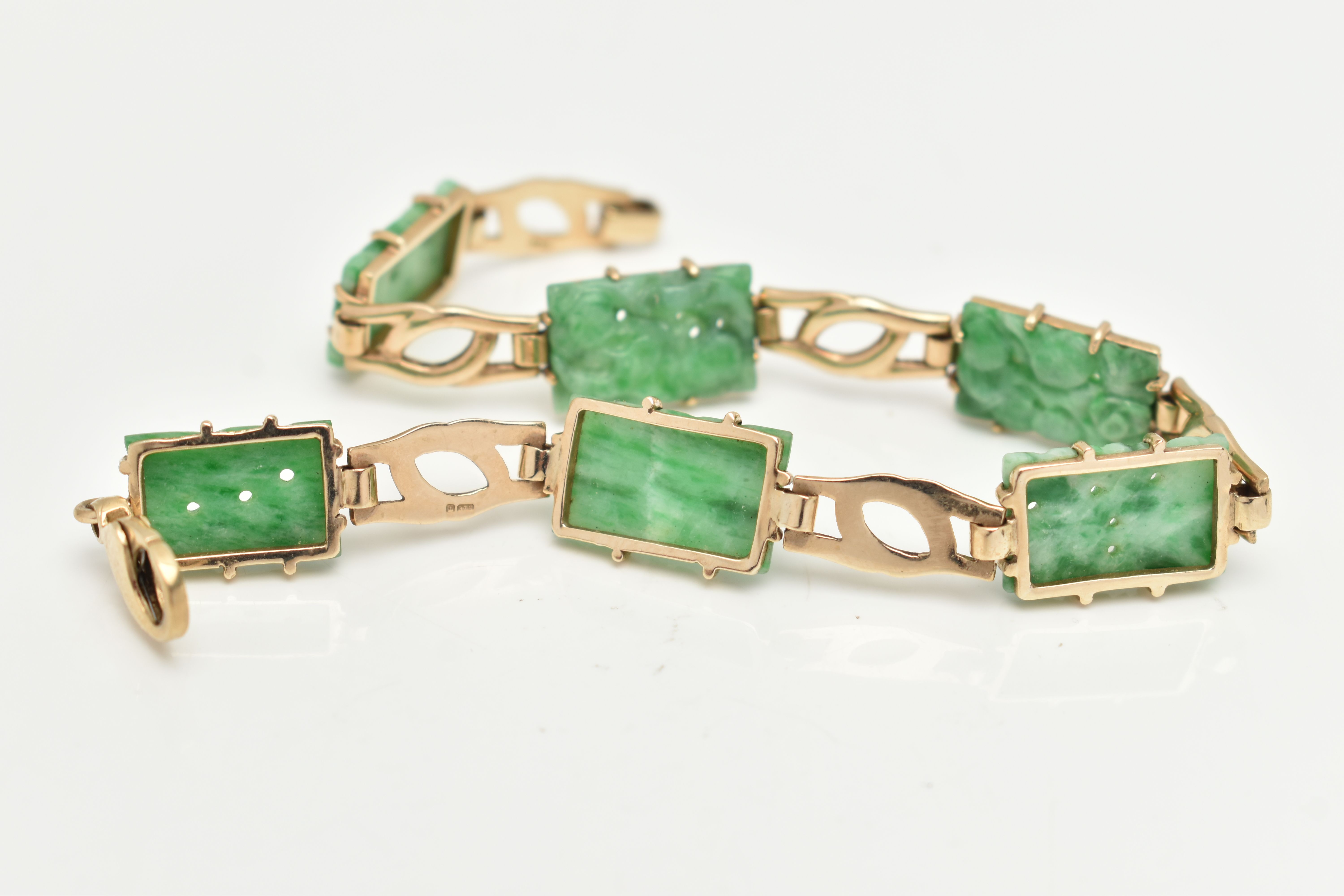 A 9CT GOLD JADE PANEL BRACELET, the rectangular jade panels carved to depict fruits and foliage, - Image 4 of 5