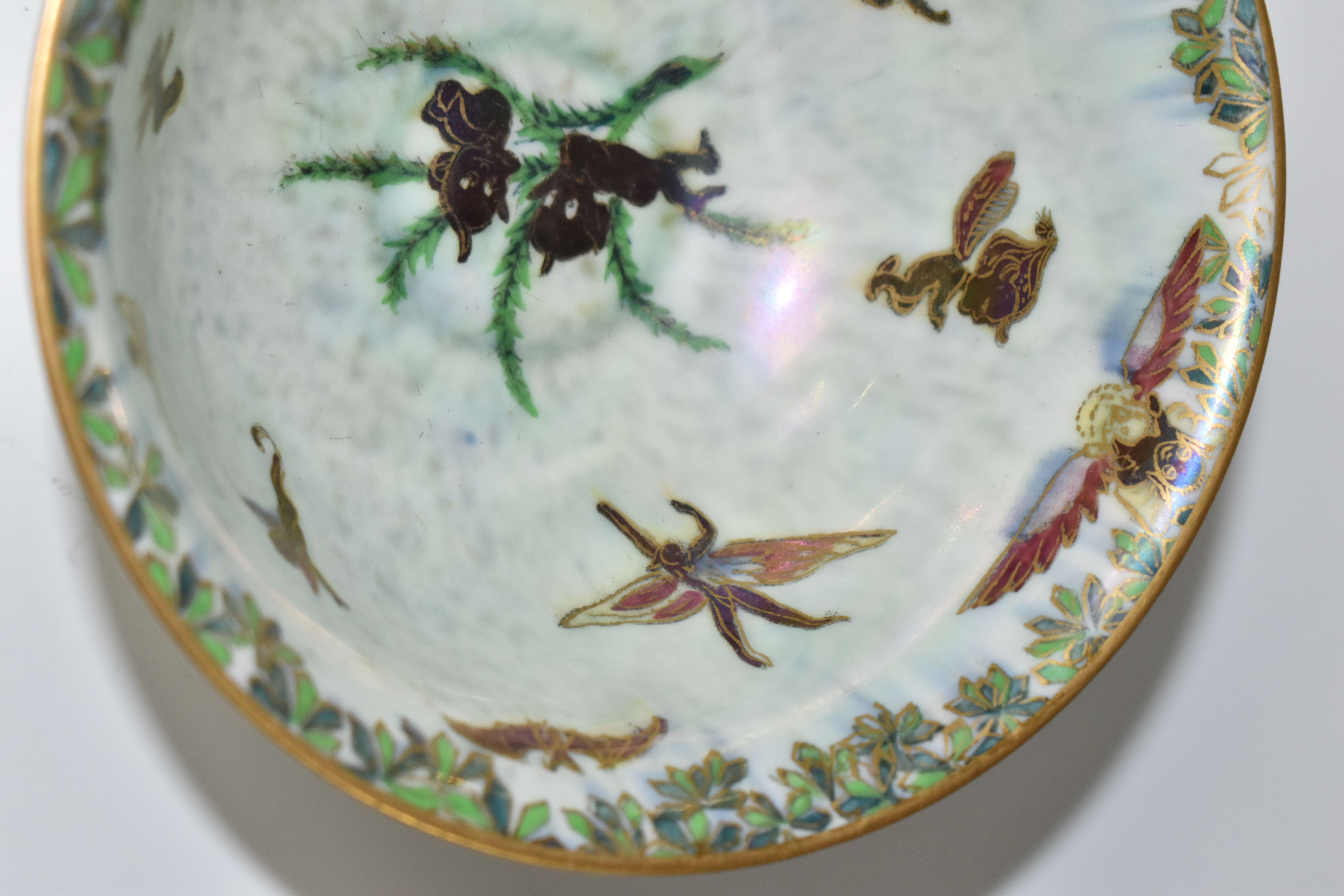 A WEDGWOOD FAIRYLAND LUSTRE FOOTED BOWL, decorated with a mother of pearl lustre with fairies in - Image 5 of 9