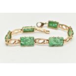 A 9CT GOLD JADE PANEL BRACELET, the rectangular jade panels carved to depict fruits and foliage,
