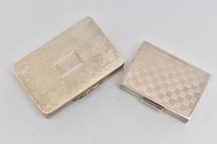 TWO SILVER SNUFF BOXES, both of rectangular outline, with engine turned detail, both with