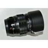 AN OLYMPUS 45MM F1.2 PRO LENS, complete with lens hood and lens caps, Condition Report: lens appears